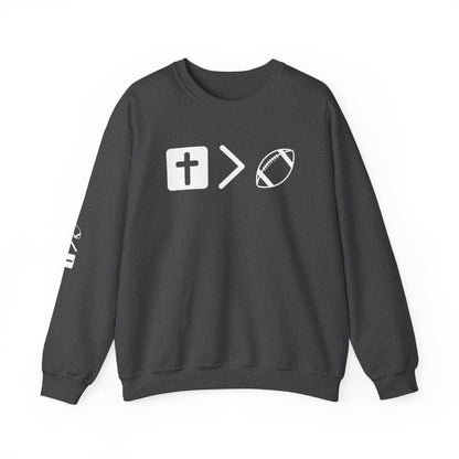 Jesus is bigger than football Unisex Heavy Blend™ Crewneck Sweatshirt