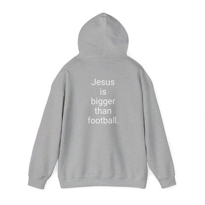 Jesus is bigger than football Unisex Heavy Blend™ Hooded Sweatshirt